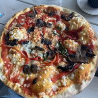 Vegan Margherita with added roasted red peppers and garlic mushrooms  at The Stable in Bristol