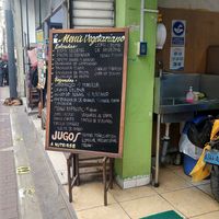 Menu board outside at El Paraiso de la Salud in Lima