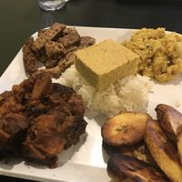 Jerk Chik’n, Mac n Cheeze, plantains, and candied yams with rice and corn bread.  at Soul Good Vegan Cafe in Durham