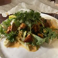 Lunch dish with sweet potato, broccoli, kale etc in a miso sauce. Served with rice paper and loadsss of cilantro 😋  at Ling Long in Stockholm