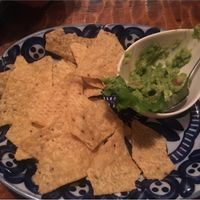 (Half eaten) chips and guacamole at Mother in Tokyo