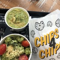 Pesto pasta and kale/artichoke dip at By Chloe - Seaport Blvd in Boston