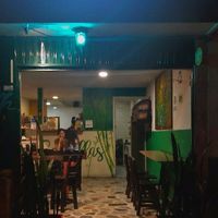 Exterior at night at Semillas Comida Sana in Pereira