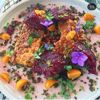 House made temph with black tahini and edible flowers  at Confluence Kombucha in St Louis