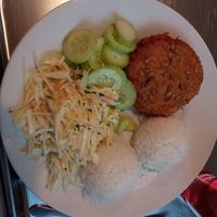 Kotlet z fasoli, ryż, ogórki, surówka z białej kapusty. at Bar Dobrze in Klodzko