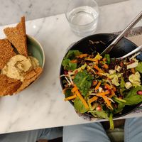 Hummus with crackers and Thai salad at Maisie Cafe in Paris