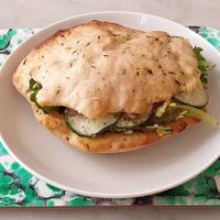 Focaccia with hummous aubergine and tzatziki at Maisie Cafe in Paris