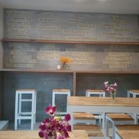 menu on the wall at Sopa in Bangkok