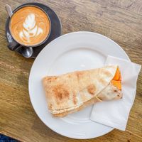 coconut flat white + moroccan butternut flatbread at The V & V Cafe in Glasgow