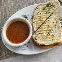 Pesto Panini w/tomato basil soup   at Green Door Cafe in La Jolla