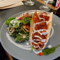 Chilli sin carne in a homemade tortilla with a garnish and sumptuous salad at Vegan Joe's  in Loule