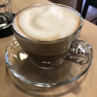 Lots of froth cappuccino  at Cardamomo Cucina Vegana in Arona