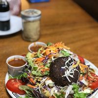 Full Phoenix Salad, dressing (red pepper) on the side. A fiesta of flavors. Fantastic! at Blue Phoenix Cafe in Lexington
