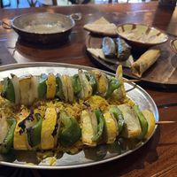 Vegan platter mostly eaten in background and vegetarian kabab    at The Casbah in Jacksonville