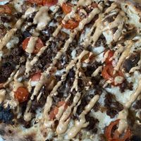 Vegan Cheeseburger Pizza  at Stoked Wood Fired Pizza in Brookline
