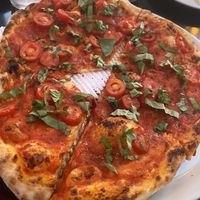 I took a bite from this. The marinara pizza.  at Stoked Wood Fired Pizza in Brookline
