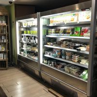 Inside store at Lilly's Green Market in Nyon