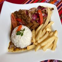 “Lomo Saltado Vegan” - $17. Good portion and the sauce that marinated the seitan had AMAZING flavor. Not overly salty.  at Sabor Peruano in Santa Fe