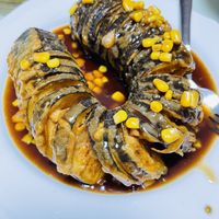 最好吃的茄子  at Gude Temple Vegetarian Restaurant in Wuhan