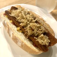 Hot dog with added kraut  at The Very Good Butchers in Victoria