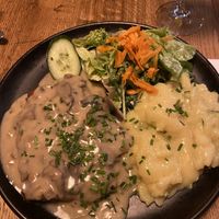 Schnitzel with potato salad   at SIGGIS v/gan dine & co. in Munich