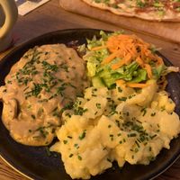 Schnitzel with potato salad   at SIGGIS v/gan dine & co. in Munich