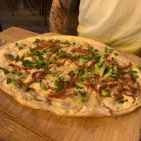 Flammkuchen w/speck  at SIGGIS v/gan dine & co. in Munich