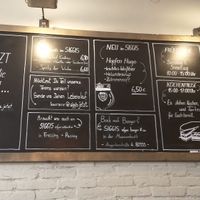 Specials board at SIGGIS v/gan dine & co. in Munich