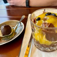 chocolate truffle ball and passion fruit chocolate mousse at SIGGIS v/gan dine & co. in Munich