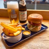 “Chicken” (yes it’s vegan) burger, fries with house sauce and ketchup plus a local beer! at SIGGIS v/gan dine & co. in Munich
