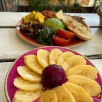 Banana & Dragon fruit bowl. Vegan big breakfast in the background. at SHAKA - Bohol in Panglao
