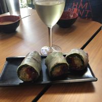 Summer rolls and white wine  at Koriente in Austin