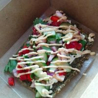 V for Veggie pizza at Vegan Hippie-Chick Cafe in Victoria