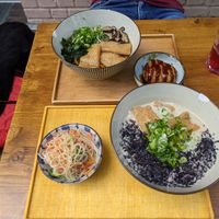 Kitsune udon and Korokke on top, Okazu(glass noodle salad this time) and Ninniku udon on bottom at Nobiko in Cologne
