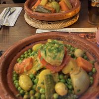roasted veg couscous in the back  at Zeitoun Cafe in Marrakech