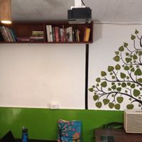 Books and Bluetooth Speaker at Bodhi Greens in Dharamshala