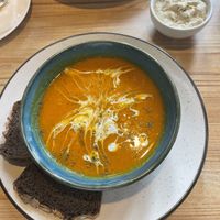 Pumpkin soup with millet bread and hummus   at Bodhi Greens in Dharamshala