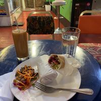 Falafel wrap and juice. Water included. at Manchester Vegan Cafe in Manchester