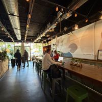 Indoor work space and community tables at The Seed in Boca Raton