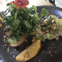Smashed avo on sourdough. at Folk in Byron Bay
