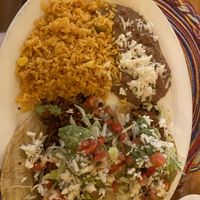 Soy chorizo tacos, refried beans, Spanish rice with vegan cheese  at Hugo's Cocina  in San Diego