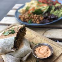Breakfast burrito 💚 at The Longhouse Cafe in Brighton