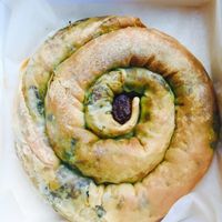 Olive and spinach spanakopita  at Olive Oil & Butter Kafe in Kingsville