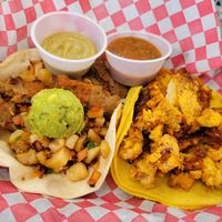 The Mi Ranchito (left) and the Three Amigos breakfast tacos at The Vegan Nom - E Cesar Chavez  in Austin