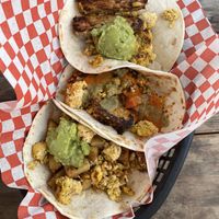 3 different tacos. Micas, Tempeh Bacon & Potato and Tofu  at The Vegan Nom - E Cesar Chavez  in Austin