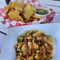 breakfast taco, nachos, and queso at The Vegan Nom - E Cesar Chavez  in Austin