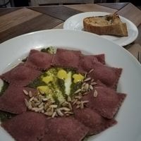 Ravioli with ricotta and pesto at De/Raiz Cocina Café - Calle 65 in Bogota