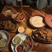 Jackfruit fajita’s with fries   at Smithy's Tavern in Huez