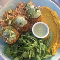 No-meatballs plate : oat salad, rucula, red lentils balls, squash hummus at The Therapist - LxFactory in Lisbon