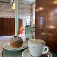 Raspberry jam brioche and soy cappuccino   at Bar Luce in Milan
